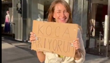 Ukraynalı Kadının İlginç Pankartı Tepki Çekti!